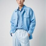 stylish-young-korean-man-poses-confidently-trendy-blue-outfit_1008996-4957
